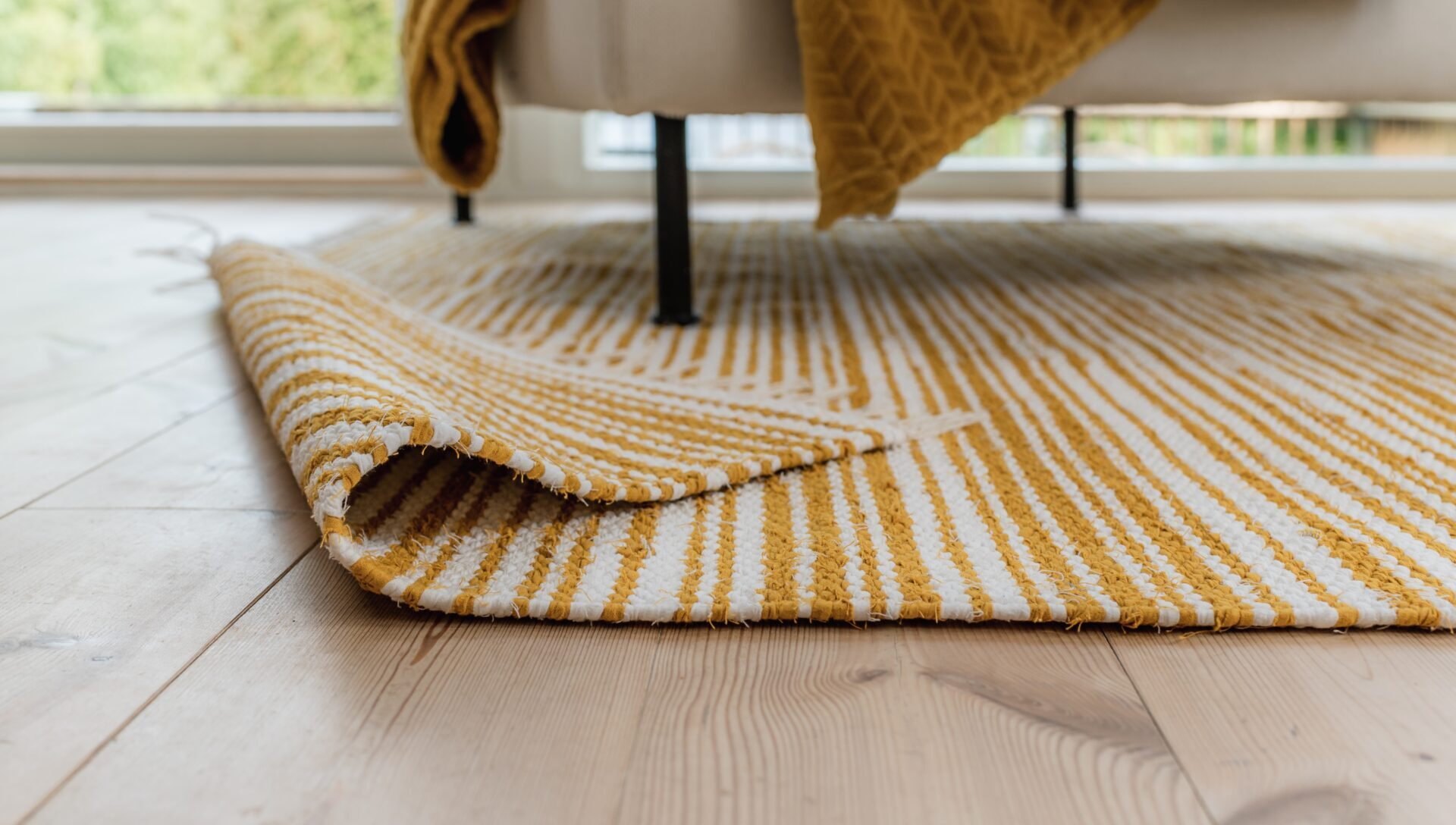Handmade Nordic rag rug, traditional Finnish cotton design, sustainable area rug for modern homes.