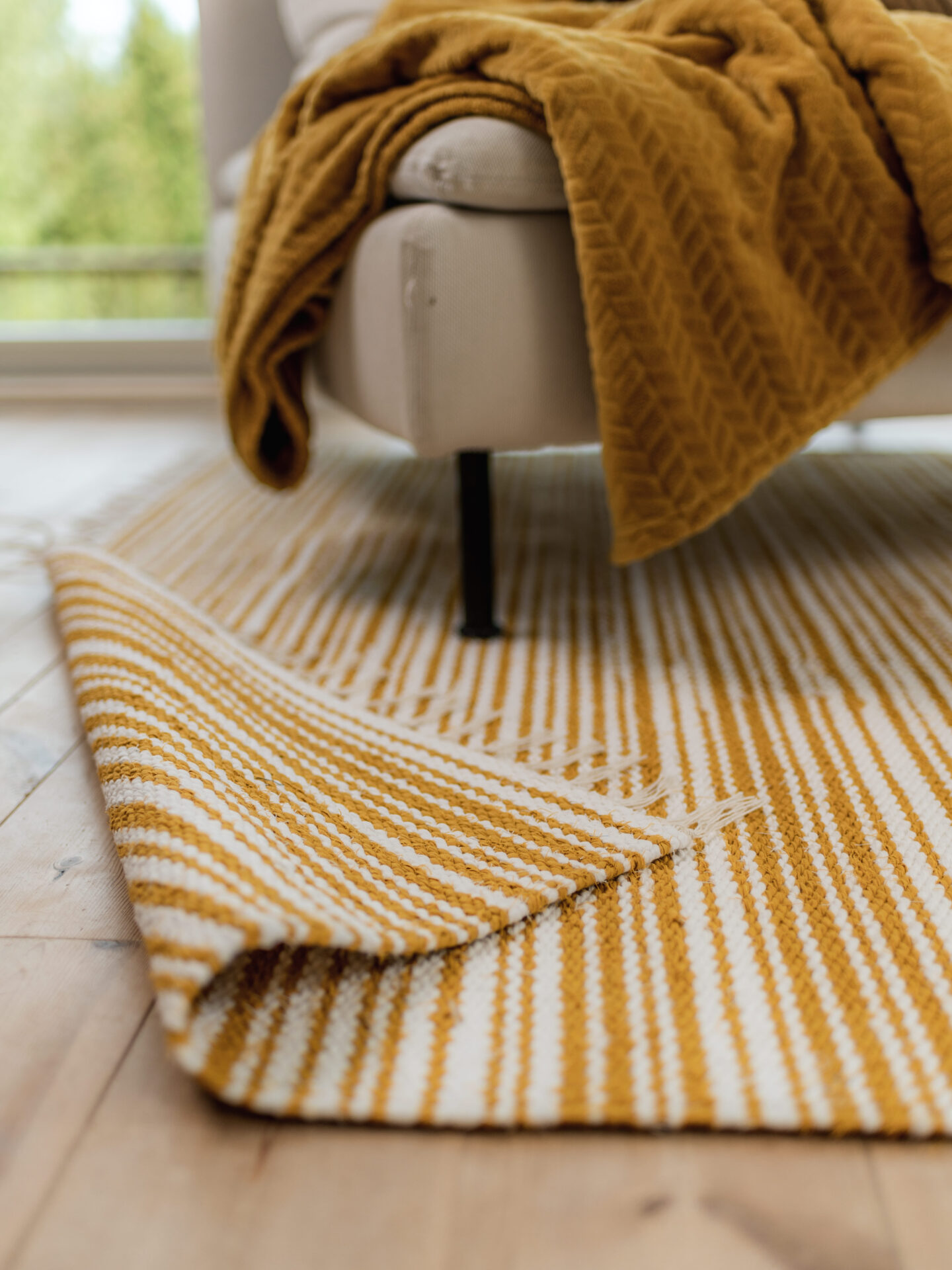 Scandinavian-style Finnish cotton rug with minimalist patterns, eco-friendly design, and a cozy Nordic aesthetic for modern interiors